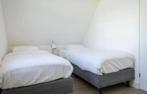 Giường trong phòng chung tại E -09 Bouwlust