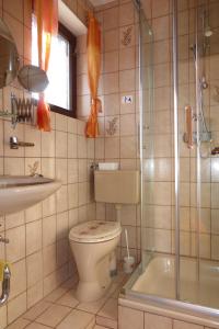 Ванная комната в Ferienwohnung Monika