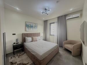 Ένα ή περισσότερα κρεβάτια σε δωμάτιο στο Sublime appartement avec Piscine, 2 chambres au Point E, Dakar +12 φωτογραφίες