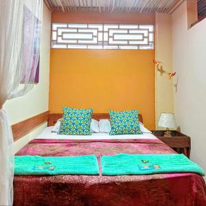 Postel nebo postele na pokoji v ubytování Amazon Home-Feliz Puerta