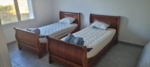 Ένα ή περισσότερα κρεβάτια σε δωμάτιο στο Maison de vacances dans les Marais