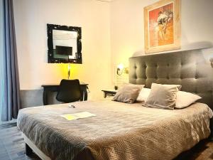 Postel nebo postele na pokoji v ubytování Hôtel Paul Riquet + 110 fotografií