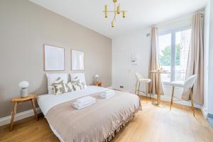 Postel nebo postele na pokoji v ubytování Studio paisible proche Paris 16ème arr - III