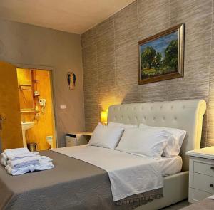 Postel nebo postele na pokoji v ubytování B&B Villa Mamma Rita