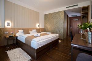 Hotel Bartoš客房内的一张或多张床位