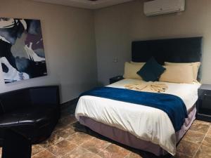 Ένα ή περισσότερα κρεβάτια σε δωμάτιο στο Thengane Lodge West +36 φωτογραφίες