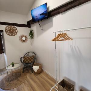 Μια τηλεόραση ή/και κέντρο ψυχαγωγίας στο Casa de Pedra +36 φωτογραφίες