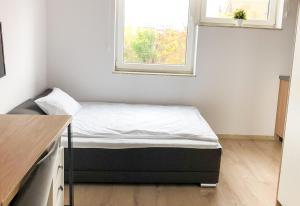 Posteľ alebo postele v izbe v ubytovaní Starter III