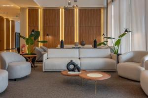 Χώρος καθιστικού στο Rio Hotel By Bourbon Luque Asuncion