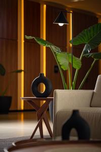 Χώρος καθιστικού στο Rio Hotel By Bourbon Luque Asuncion