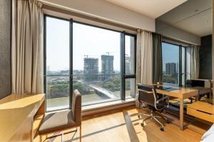 Fotografie z fotogalerie ubytování Snug Gaokong Jiangjing Hotel v Kantonu