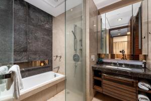 Koupelna v ubytování Snug Gaokong Jiangjing Hotel + 37 fotografií