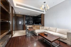 Kuchyň nebo kuchyňský kout v ubytování Snug Gaokong Jiangjing Hotel