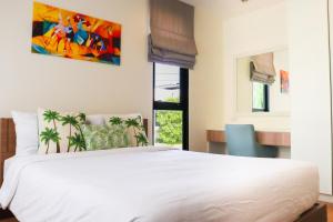 Ένα ή περισσότερα κρεβάτια σε δωμάτιο στο Welcoming 3bdr Townhouse Laguna Park +30 φωτογραφίες