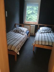 Postel nebo postele na pokoji v ubytování Monteurwohnung Fekete