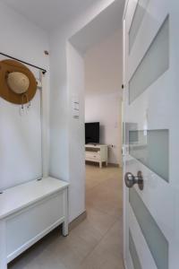 TV a/nebo společenská místnost v ubytování Casa La Mar