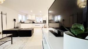 Η κουζίνα ή μικρή κουζίνα στο Wohlfühl-Loft für dein Schwarzwaldabenteuer +27 φωτογραφίες
