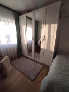Postel nebo postele na pokoji v ubytování Apartament Vis Ramiro