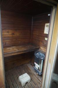 a small sauna with a bench in the middle at Malta Edgewater Inn and RV Park in Malta +11 photos