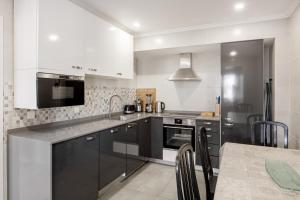 Η κουζίνα ή μικρή κουζίνα στο Prana Nature at Setúbal Oasis with Pool +37 φωτογραφίες