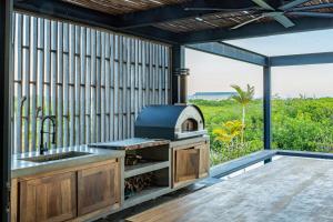 Gambar di galeri bagi Villa Okeanos di Placencia Village