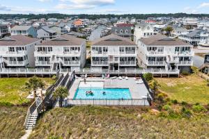 an aerial view of a pool at a resort at Waters Edge 433-C OBW in Holden Beach