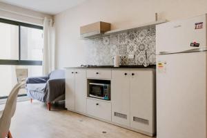 Kuchyň nebo kuchyňský kout v ubytování Delightful 1BR Spacious Terrace in Barranco