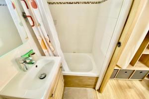 a bathroom with a sink and a shower at Studio near the city center in Montpellier +6 photos