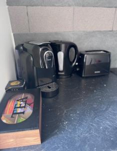Kemudahan buat kopi dan teh di Super appartement cosy