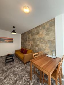 Posezení v ubytování Apartamentos La Aldea Suites