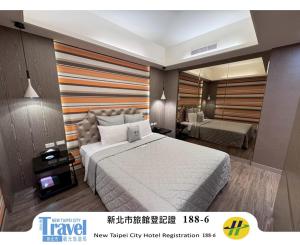 探索汽车旅馆-永和分馆客房内的一张或多张床位