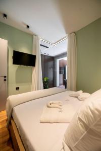 Postel nebo postele na pokoji v ubytování PR Parga Apartment