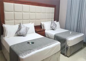 En eller flere senge i et værelse på The Princess Guest House + 7 billeder