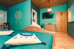 En eller flere senge i et værelse på Sfizioso Boutique Stay Brasov - Free Parking