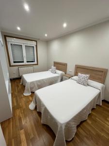 Postel nebo postele na pokoji v ubytování Casa Branca