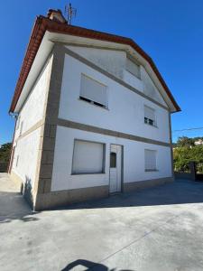 Budova, kde se prázdninový dům nachází + 7 fotografií