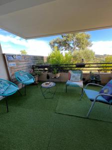 En balkon eller terrasse på Charme et calme