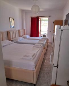 Ένα ή περισσότερα κρεβάτια σε δωμάτιο στο Melina rooms