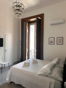 Ένα ή περισσότερα κρεβάτια σε δωμάτιο στο La bella vita luxury apartament and travel solution