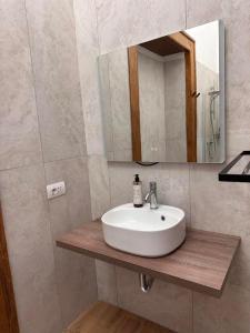 Ένα μπάνιο στο La bella vita luxury apartament and travel solution