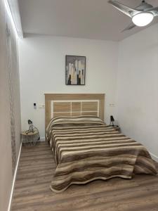 Postel nebo postele na pokoji v ubytování Apartamento blanco y negro en el centro