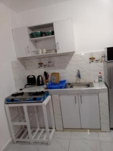 Η κουζίνα ή μικρή κουζίνα στο Fahari Homes