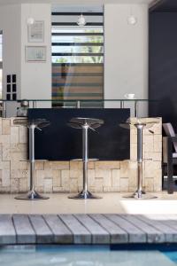Bazén v ubytování Winds Boutique Hotel nebo v jeho okolí