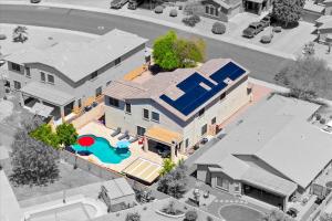an overhead view of a house with a swimming pool at Pool Grill Games Chill - Surprise Awaits in Surprise