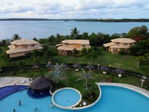 an aerial view of a resort with a swimming pool at Village Club in Pipa