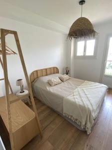 Giường trong phòng chung tại Magnifique Appartement 6 Personnes +4 ảnh