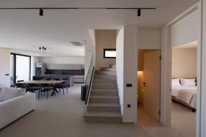 Ένα ή περισσότερα κρεβάτια σε δωμάτιο στο Gemini Villas Chania - Calma & Siesta +52 φωτογραφίες