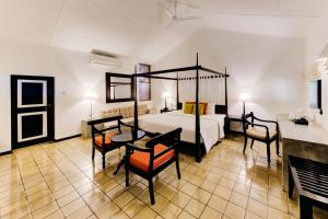 Una cama o camas en una habitación de Habarana Village by Cinnamon