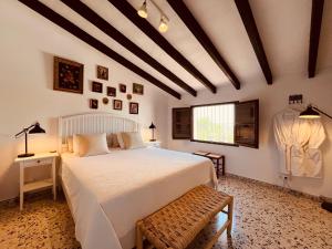 Postel nebo postele na pokoji v ubytování Casita Comares - bed and breakfast - La Alquería - Comares - Málaga