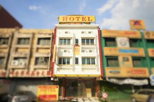 a toy building with a hotel on top of it at Ipoh Road Hotel in Kuala Lumpur